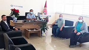 Dinar Ülkü Ocakları Başkanı Çetin’den Müdür M. Mithat Coşkun’a Ziyaret