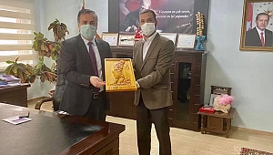 Başkan Ertuğrul Çetin Kaymakam Selami Kapankaya'yı ziyaret etti