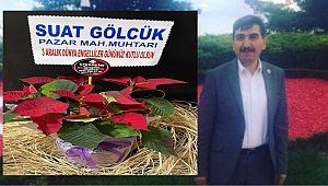 Muhtar Suat Gölcük Engellilere Hediye ve Çiçek Takdim Etti